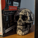 What appears to be an innocent victim’s shrunken head, next to “How-to” guides on terrorism.